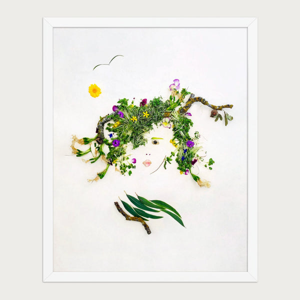 Meadow Muse feminine nature-inspired wall art in a white frame on a warm cream background