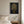 Midnight Garden Lady art in a white frame styled in a bedroom