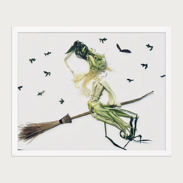 Midnight Ride botanical witch wall art print by FloraFusion in a white frame, front view
