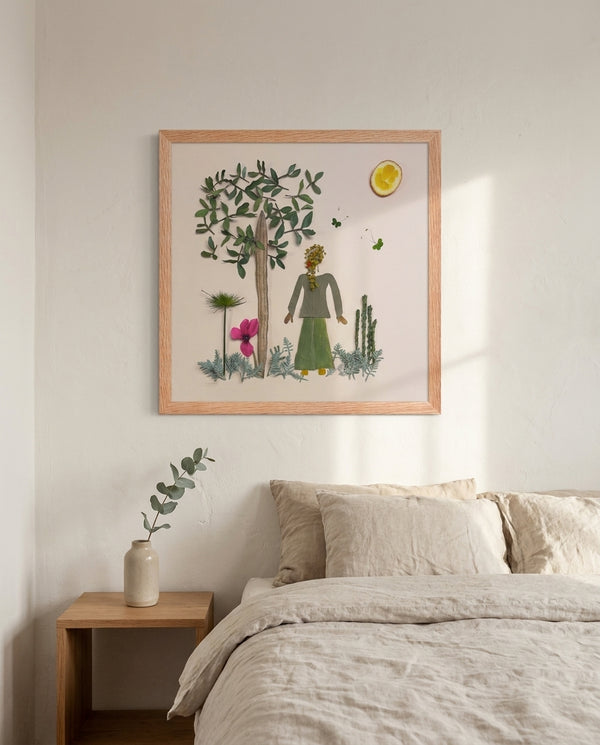 Mimosa Morning botanical garden scene wall art print in a red oak wood frame hanging in a bedroom