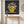 Moonlit Blooms dark botanical still life wall art print in a black frame hanging in an entryway