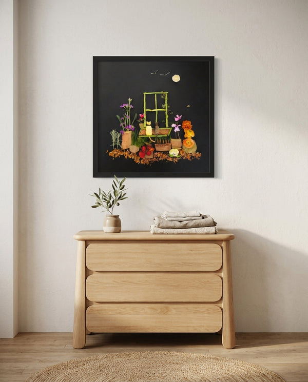 Night Garden Cats botanical cat scene wall art print in a black frame hanging in a kids room