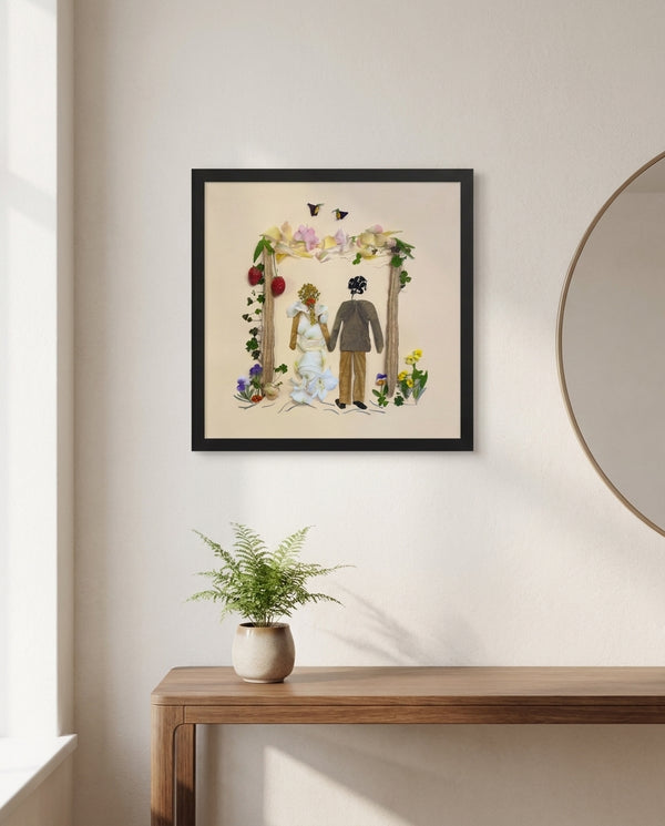 Petal Arch Wedding botanical wedding scene wall art print in a black frame hanging in an entryway