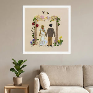 Petal Arch Wedding botanical wedding scene wall art print in a white frame hanging in a living room