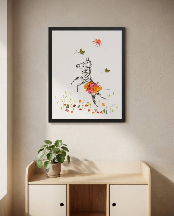 Petal Dance Zebra playful floral animal wall art print in a black frame hanging in a kids room
