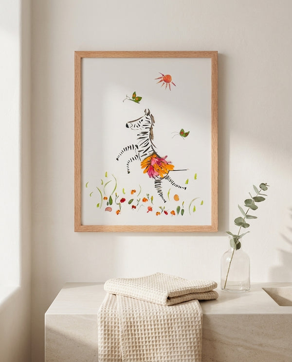 Petal Dance Zebra playful floral animal wall art print in a red oak wood frame hanging in a bathroom