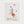 Petal Dance Zebra playful floral animal wall art print by FloraFusion in a white frame, front view