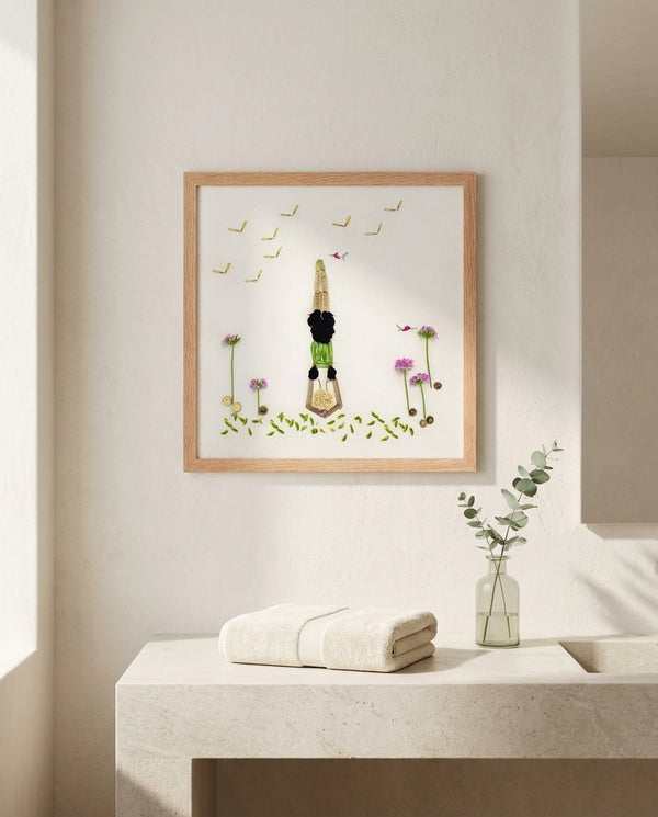 Petals in Balance art in a red oak frame styled in a bathroom