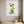 Plant Harmony art in a white frame hanging in a kitchen
