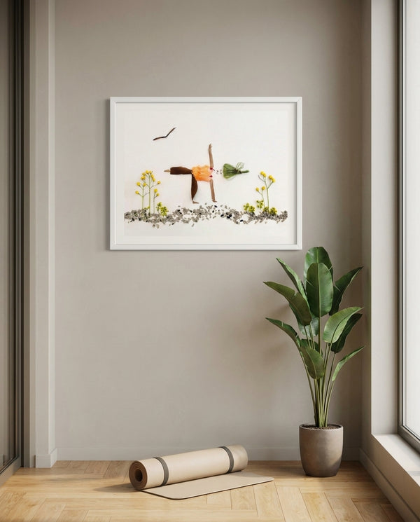 Poised in Nature art in a white frame styled in a yoga studio