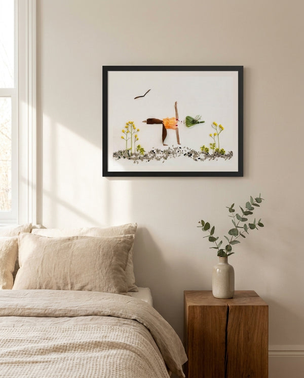 Poised in Nature art in a black frame styled in a bedroom