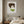 Quiet Forest Woman art in a white frame hung in a serene bedroom
