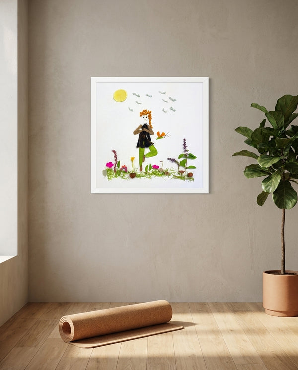 Rooted Tree Pose art in a white frame hung in a serene yoga studio