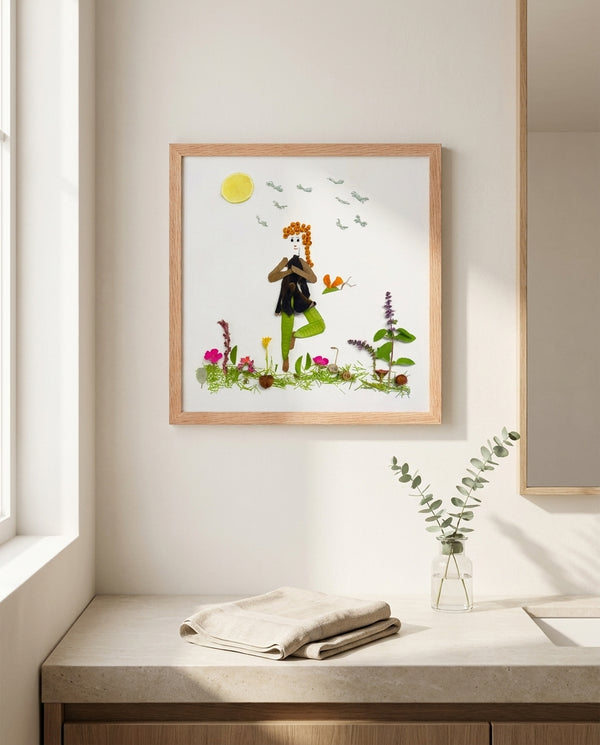 Rooted Tree Pose art in a red oak frame hung in a bathroom