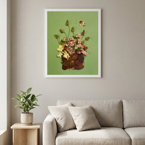 Rosy Gathering botanical still life wall art print in a white frame hanging in a living room