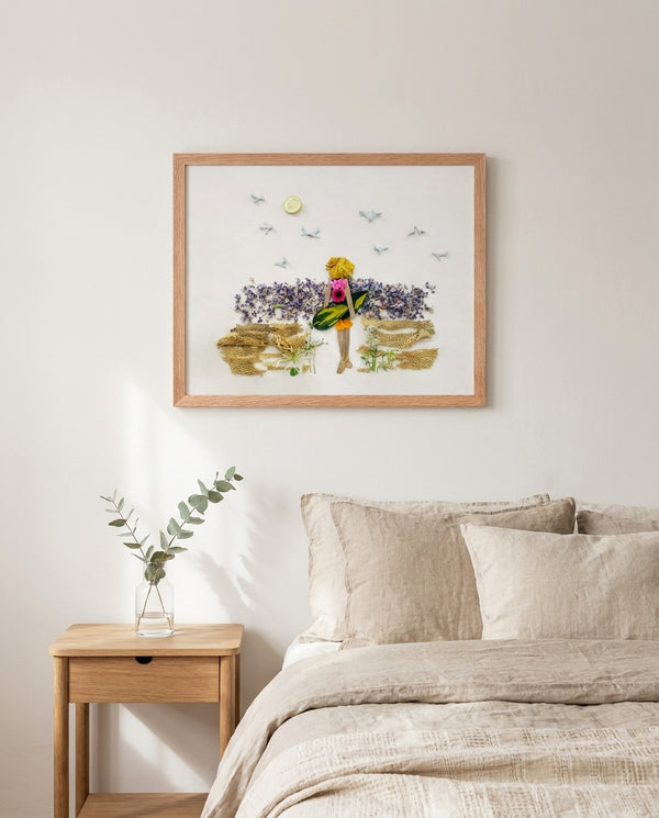 Seaside Daydream botanical beach scene wall art print in a red oak wood frame hanging in a bedroom