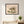 Songbird Rhino botanical animal wall art print in a black frame hanging in a kids room