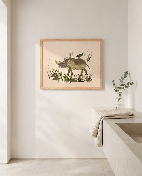 Songbird Rhino botanical animal wall art print in a red oak wood frame hanging in a bathroom