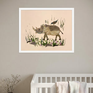 Songbird Rhino botanical animal wall art print in a white frame hanging in a nursery