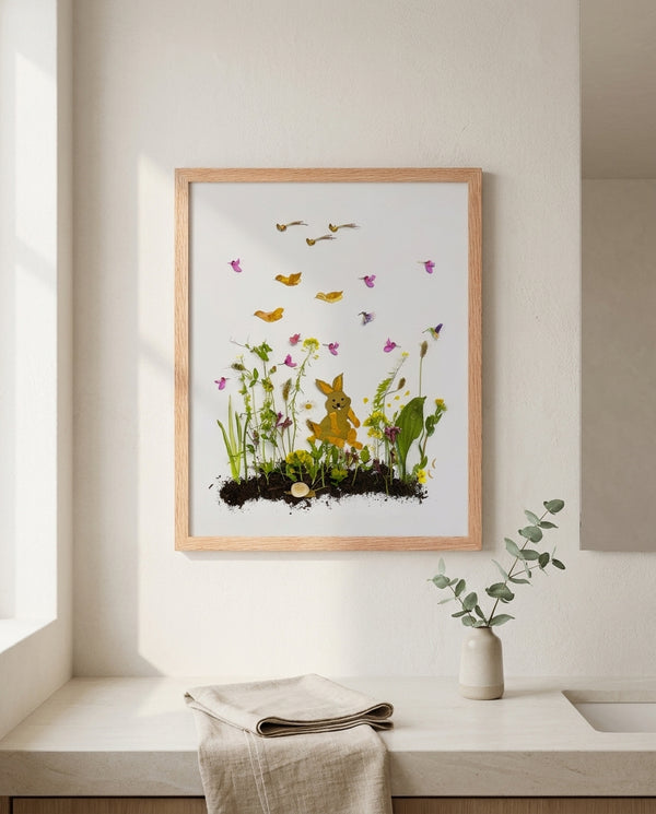 Springtime Bunny botanical bunny wall art print in a red oak wood frame hanging in a bathroom
