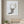 Still Forest Deer art in a white frame in a serene nursery