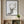 Still Forest Deer art in a black frame in a kids room