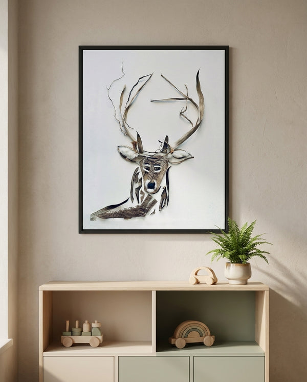 Still Forest Deer art in a black frame in a kids room