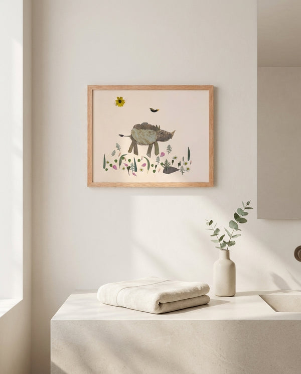 Little Rhino botanical baby rhino wall art print in a red oak wood frame hanging in a bathroom
