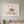 Little Rhino botanical baby rhino wall art print in a white frame hanging in a nursery