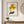 Sunflower Tresses floral feminine portrait wall art print in a red oak wood frame hanging in an entryway
