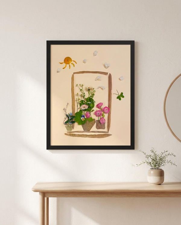 Sunlit Windowsill botanical garden window wall art print in a black frame hanging in an entryway