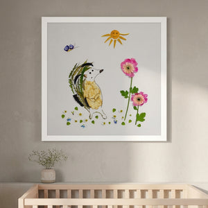 Sunny Day Hedgehog whimsical hedgehog wall art print in a white frame hanging in a nursery