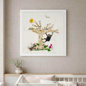 Tree Play Monkey art in a white frame in a serene nursery