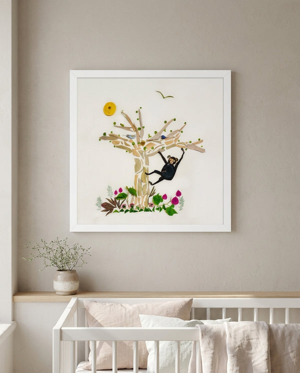 Tree Play Monkey art in a white frame in a serene nursery