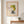 Whispering Spring botanical feminine profile wall art print in a red oak wood frame hanging in an entryway