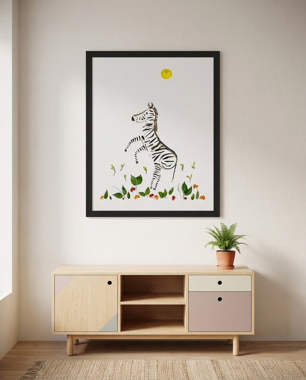 Wild Rising Zebra botanical wildlife wall art print in a black frame hanging in a kids room