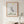 Wild Rising Zebra botanical wildlife wall art print in a red oak wood frame hanging in a bathroom