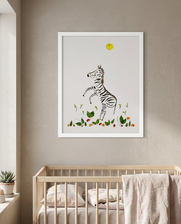 Wild Rising Zebra botanical wildlife wall art print in a white frame hanging in a nursery