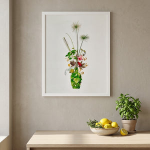 Wild Stem Vessel in a white frame hung in a bright kitchen