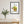 Wild Strawberry Vase botanical print in a black frame in a dining room