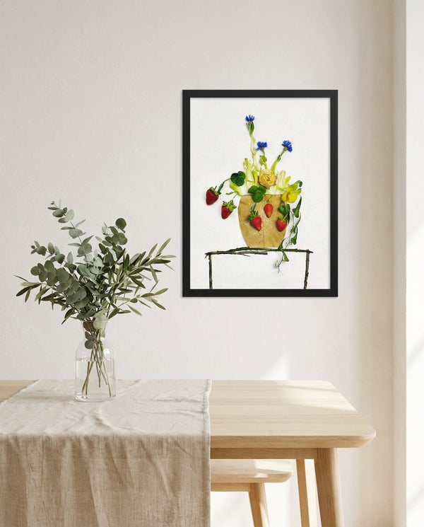 Wild Strawberry Vase botanical print in a black frame in a dining room