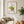 Wild Strawberry Vase botanical print in a red oak frame in a living room