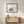 Woodland Porcupine art in a black frame hung in a kids room